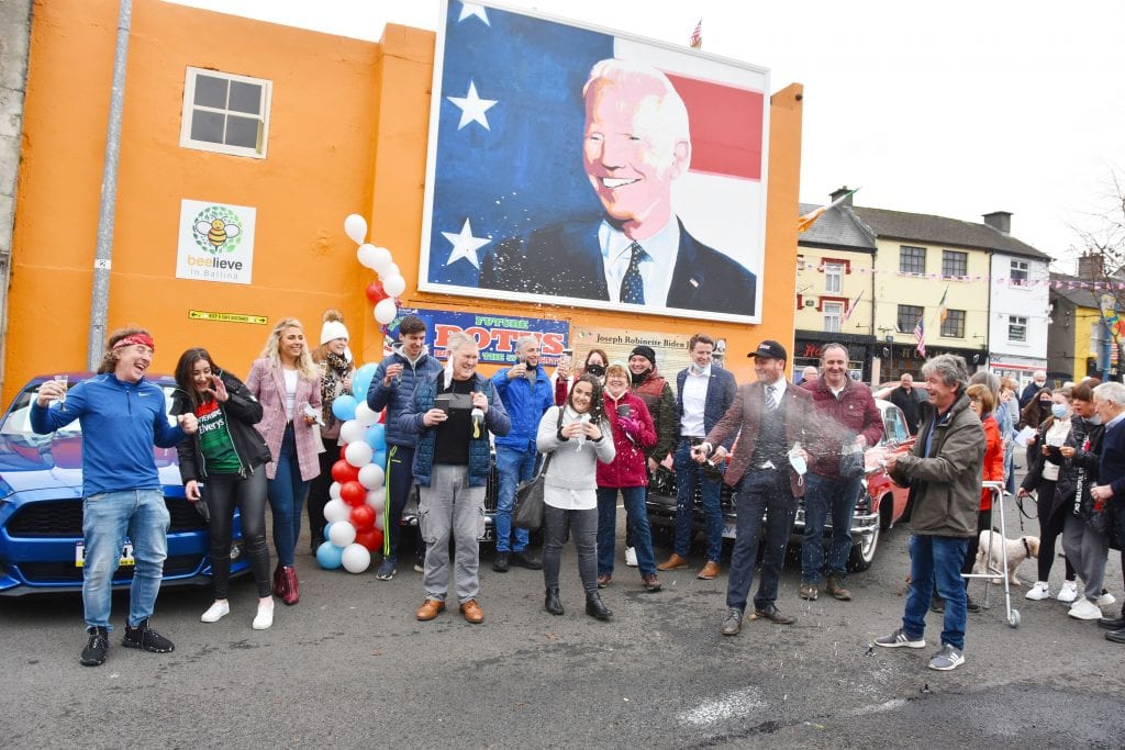 Joe Biden Victory Celebrations in the Market Square, Ballina, Co. Mayo with the Ballina Community Clean up team who erected the mural. Picture: John O'Grady.